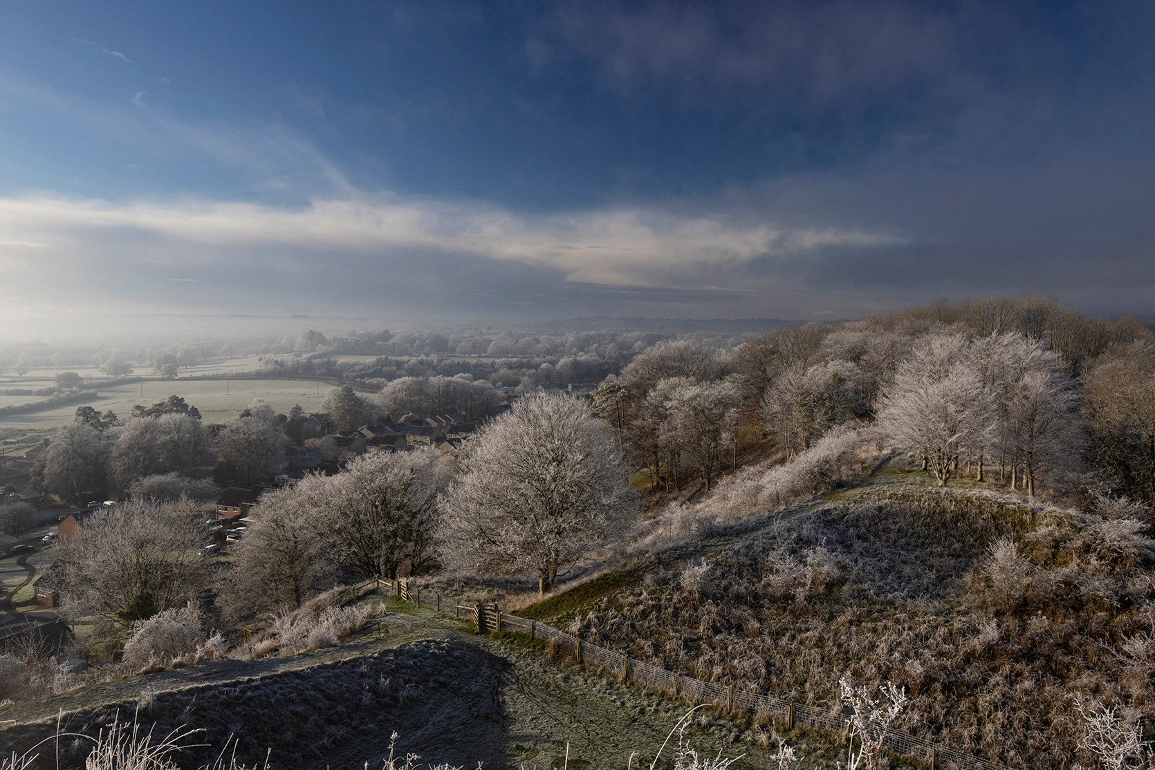 A frosty english morning overlooking the Wiltshire and Dorset Countryside - England